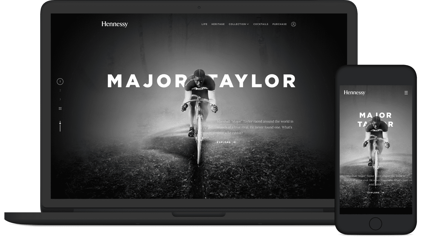 Screenshot of hennessy.com/us/ home page with Marshall Taylor riding a bicycle.